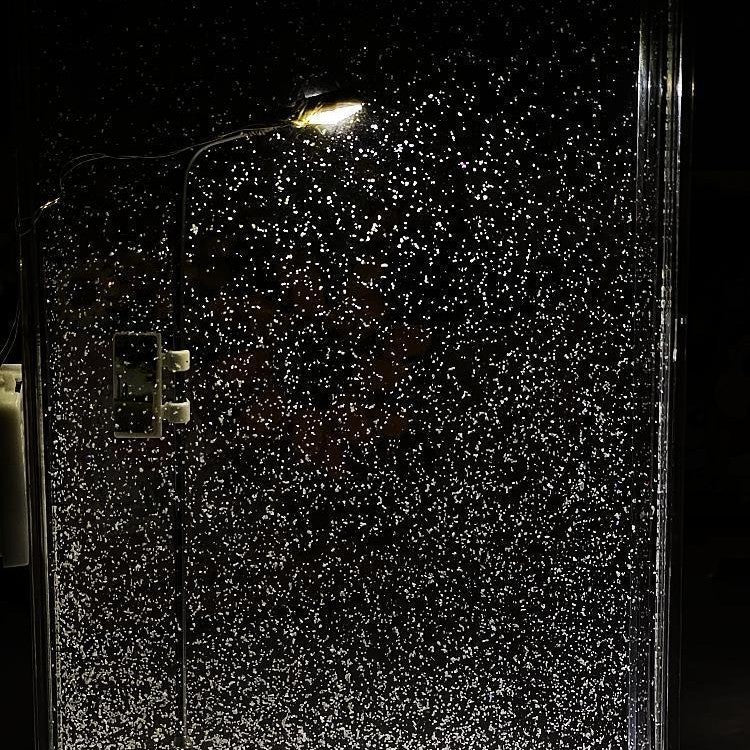 Handmade snowy landscape night lights illuminating a snowy scene with sparkling effects for Christmas decor.