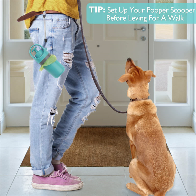 Dog pooper scooper attached to a person's belt while walking a dog at home, showcasing its convenience for pet owners.